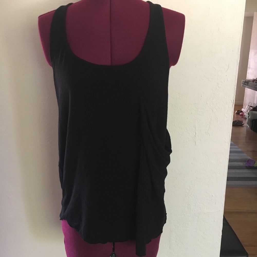 Flowy racerback tank with front pocket detail