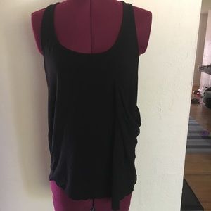 Flowy racerback tank with front pocket detail
