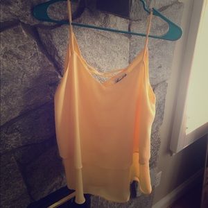 Yellow sleeveless shirt