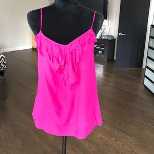 Fuchsia ruffled blouse.