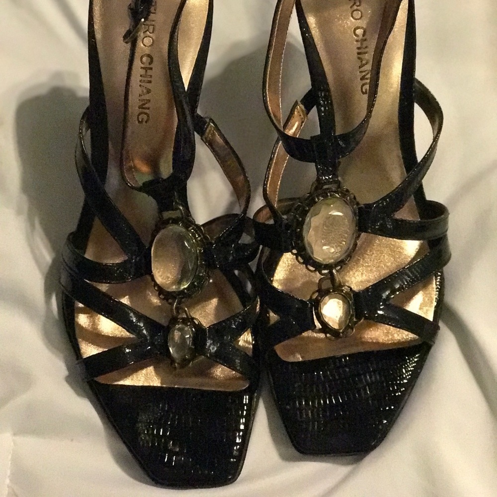 Excellent condition black with stone design heels