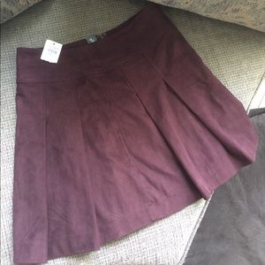 Maroon pleated suede mini skirt