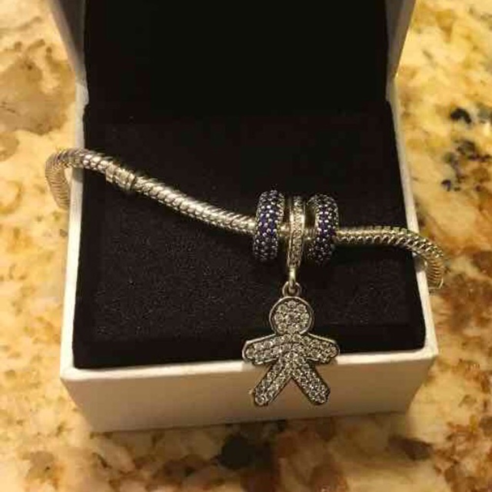 Pandora boy charm not spacers includes.