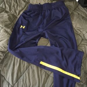 Navy blue and yellow Underarmour sweatpants