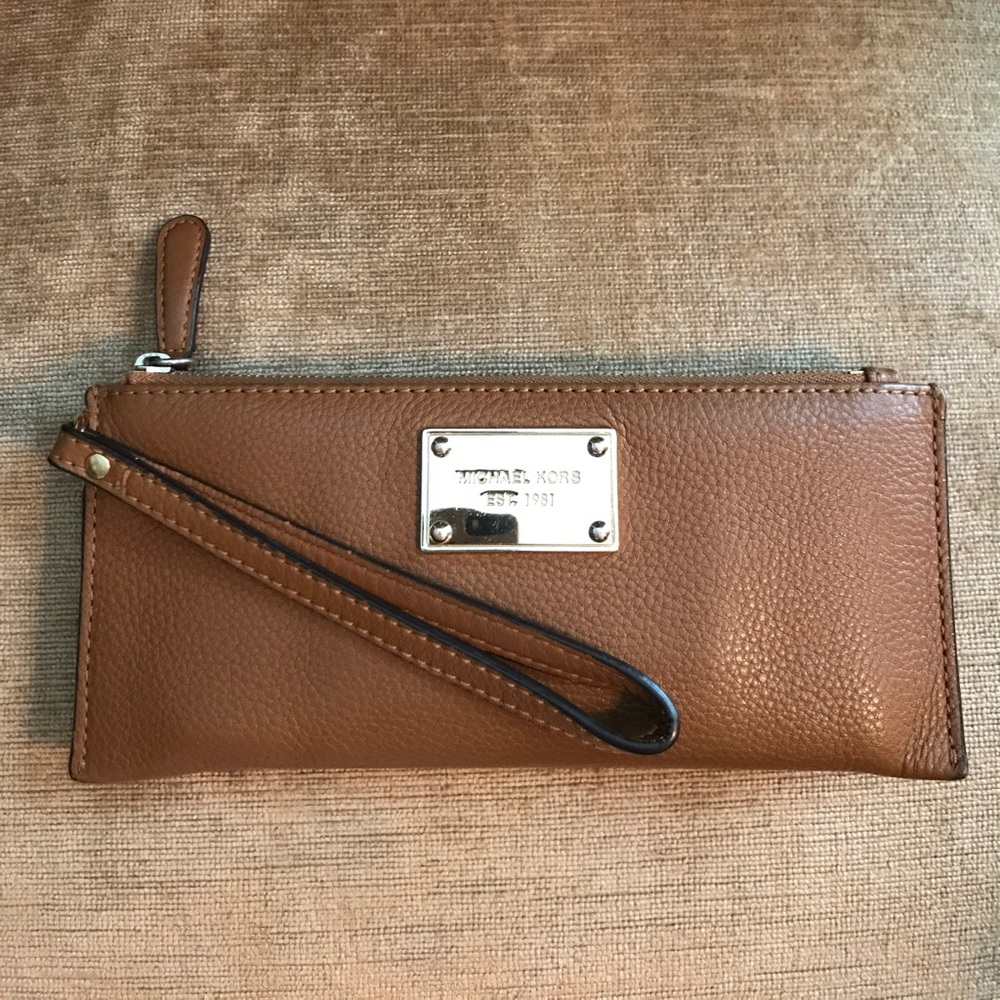 Sold! Michael Kors wallet/wristlet,hold smartphone