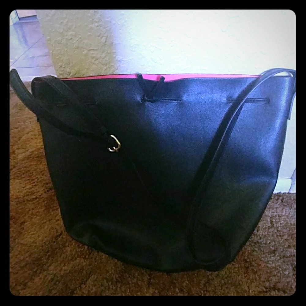 Pink and black purse