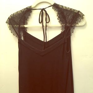 Black lace cap sleeve top from Anthropologie