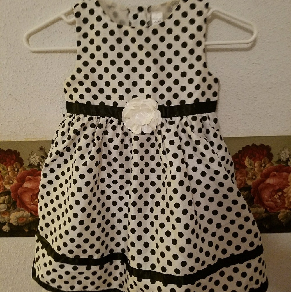 Polka dot dress with flower