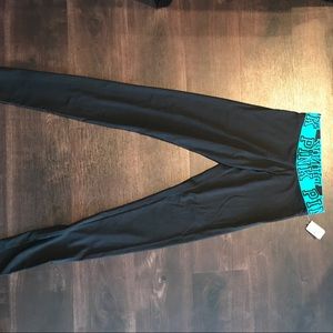 Pink yoga leggings, black with turquoise band
