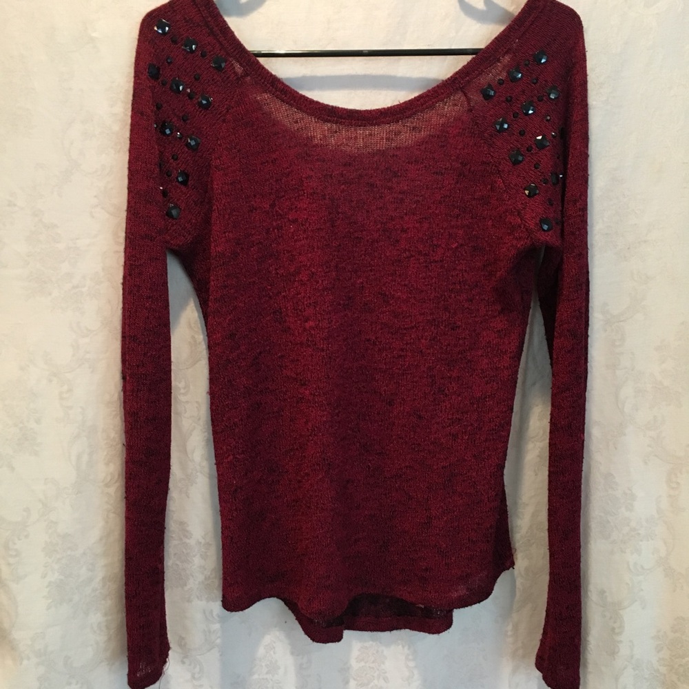 Red long sleeve embellished top