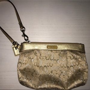 Gold metallic Coach wristlet