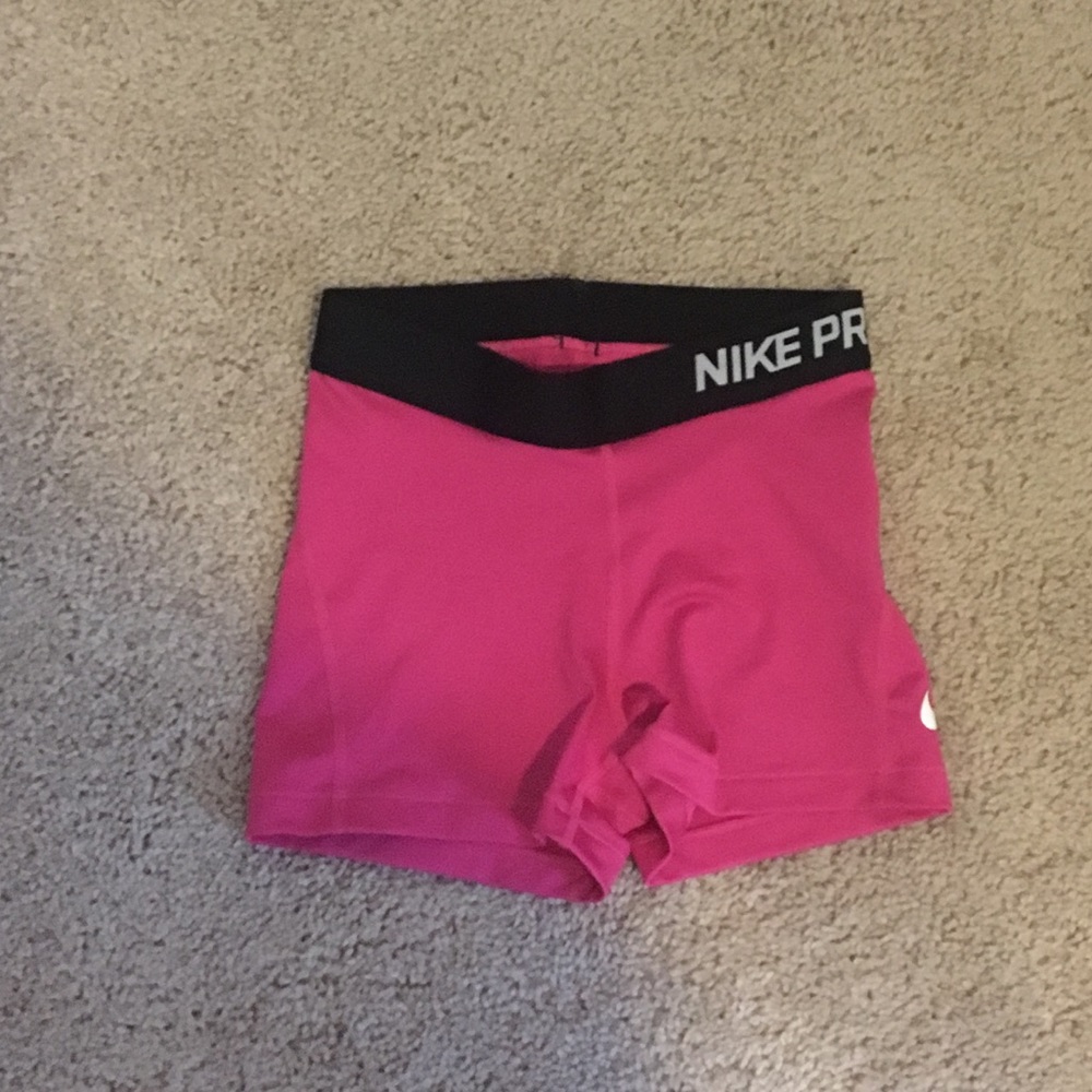 Pink Nike shorts