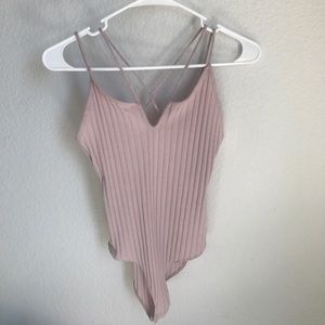 Cute mauve pink strappy bodysuit. Only worn once