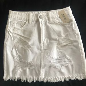White distressed denim skirt