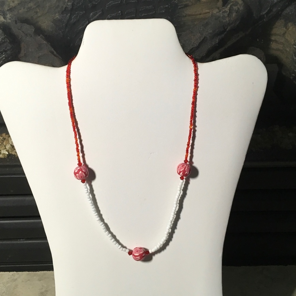 Hand made toggle chain in red and white.