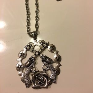Gun and rose necklace