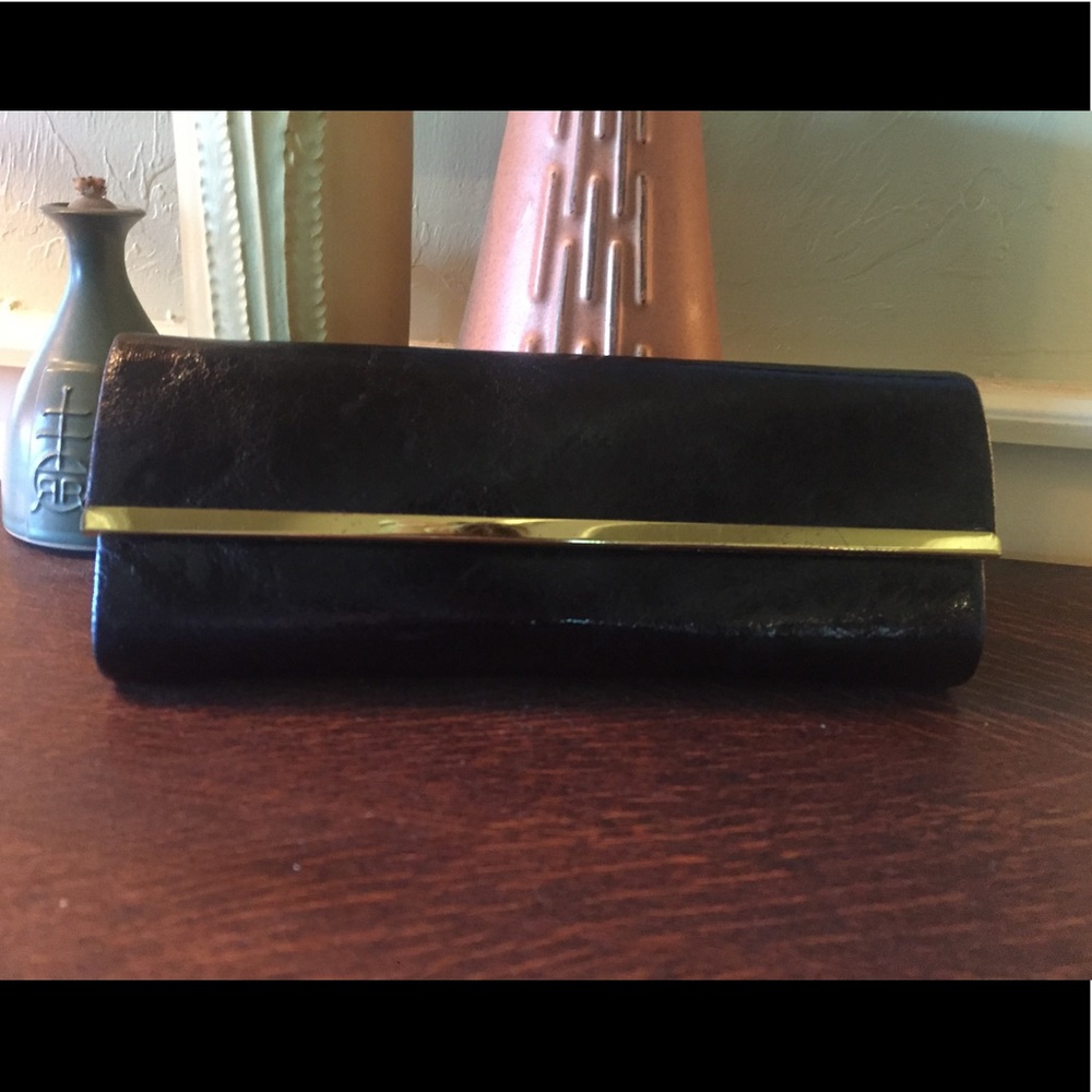 Black and gold clutch.