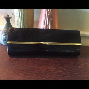 Black and gold clutch.