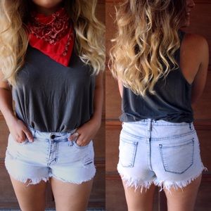 High waisted distressed jeans