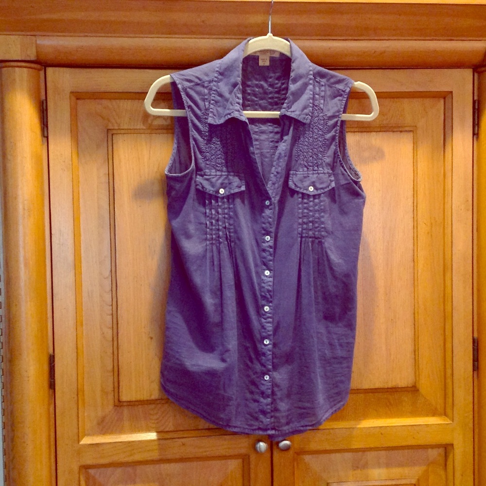 Sleeveless button front shirt