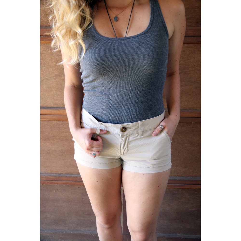 Tan shorts.