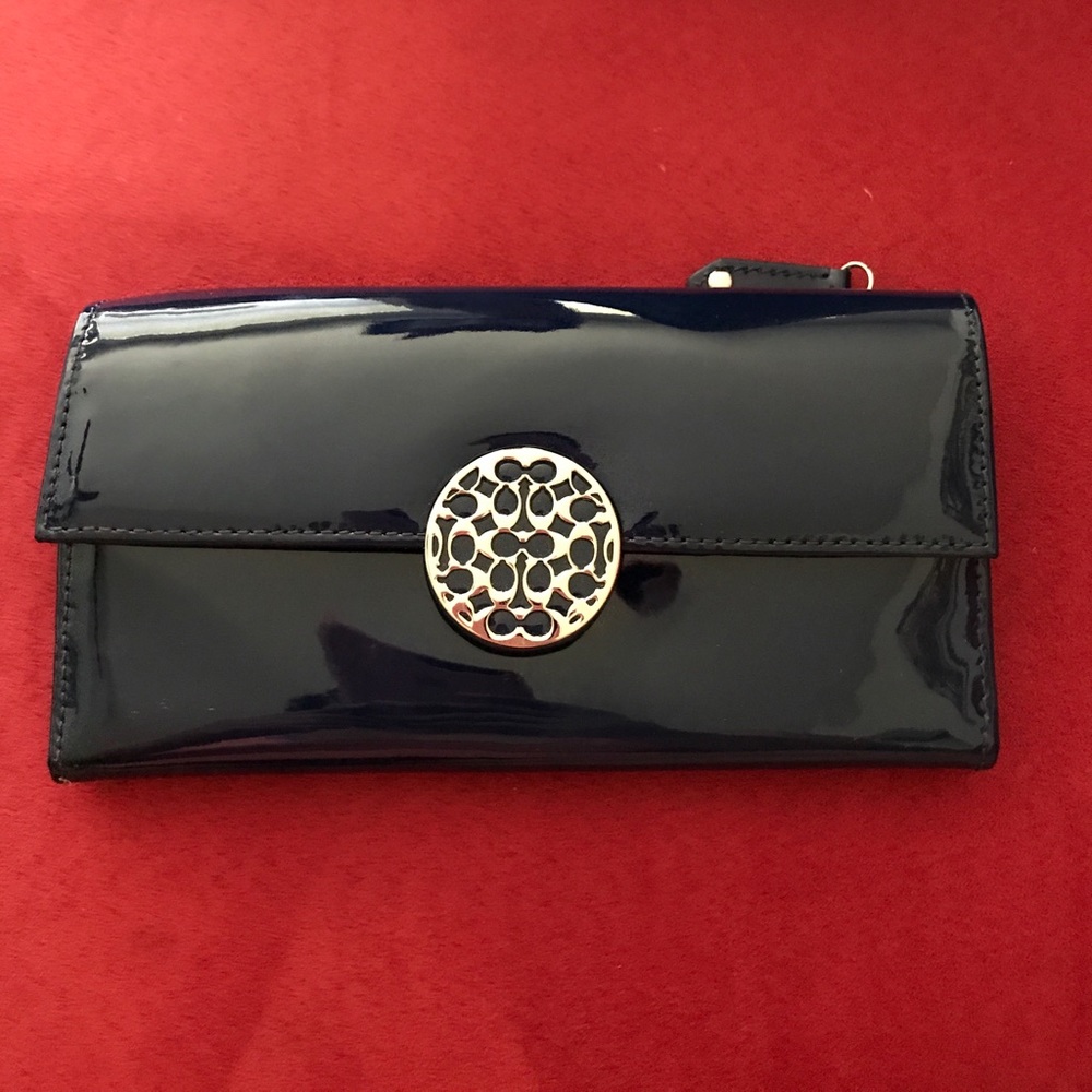 Coach wallet in a dark blue. Today only sale!!!!