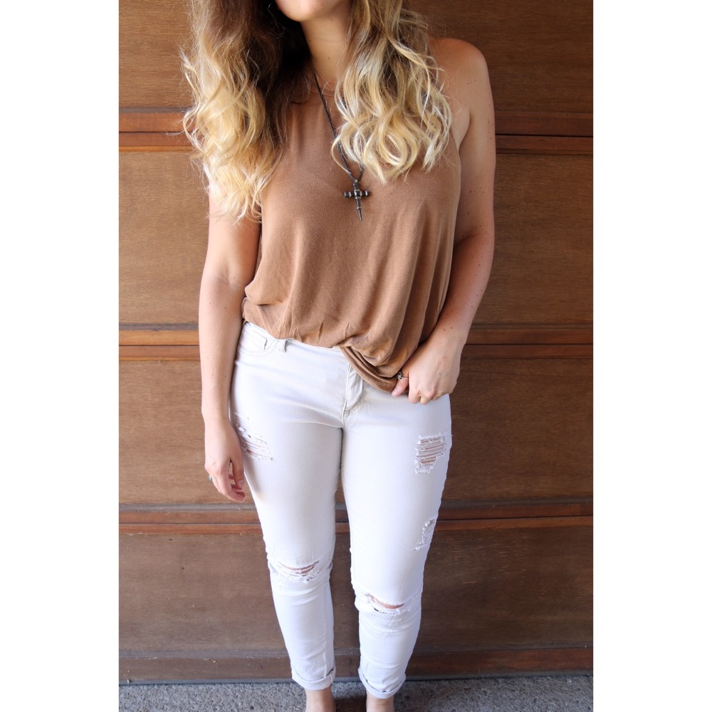 Distressed tan casual pants.