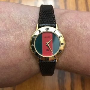 Gucci watch - has scratch