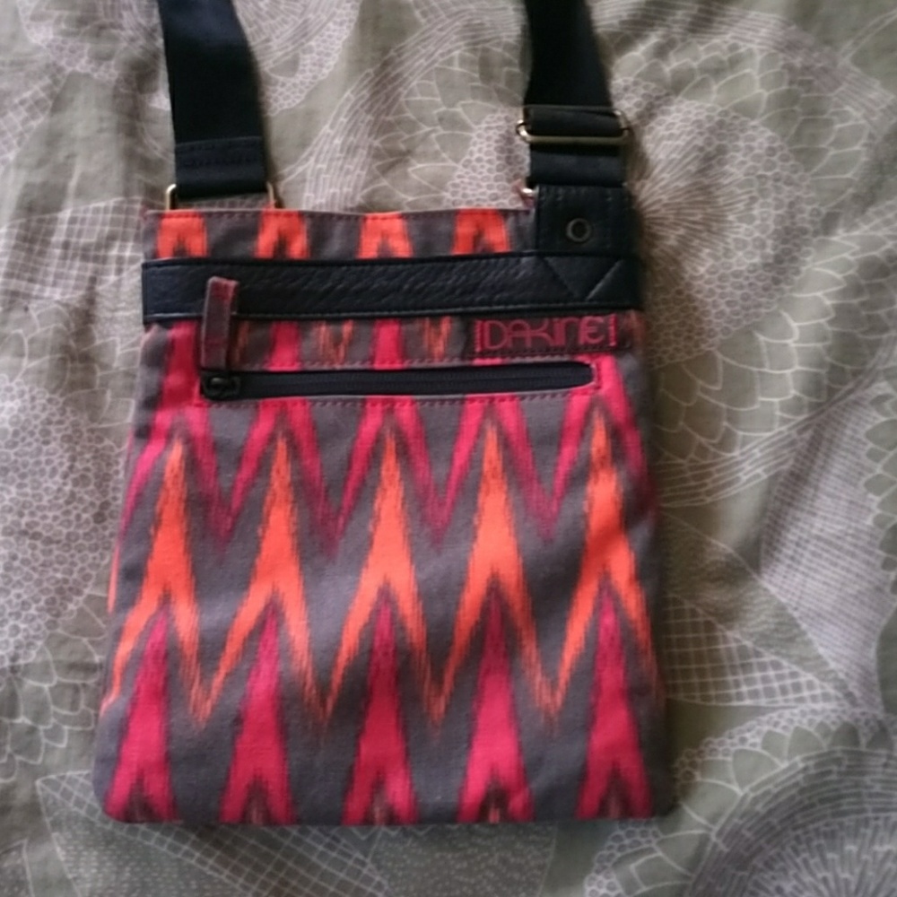 DaKine cross-body shoulder bag fire pattern
