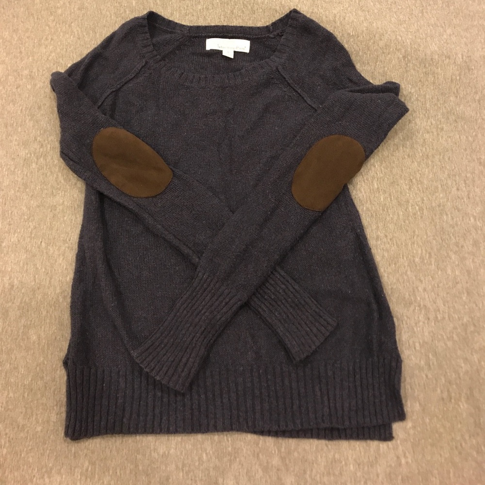 Sweater with arm patch