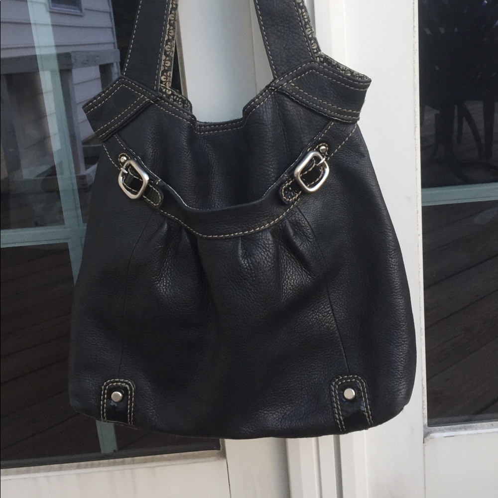 Black fossil shoulder bag with floral print inside