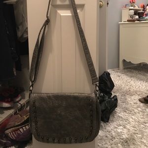 Grey studded handbag with zipper