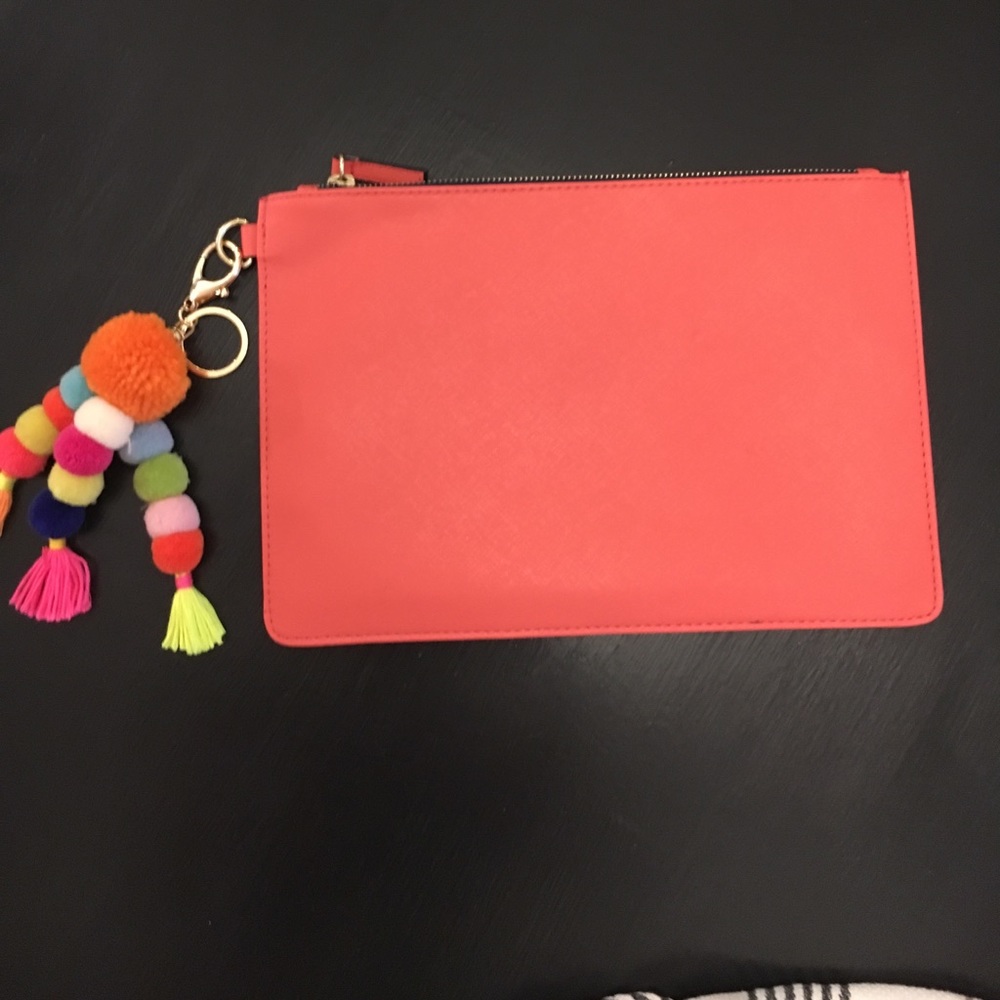 Super cute pom pom orange clutch