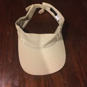 Tan and white visor