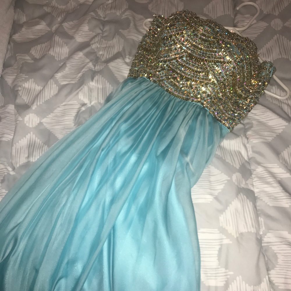 La femme beaded gown