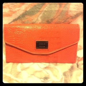 Cute orange Nichole by Nichole Miller clutch