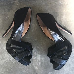 Black satin peep toe pumps