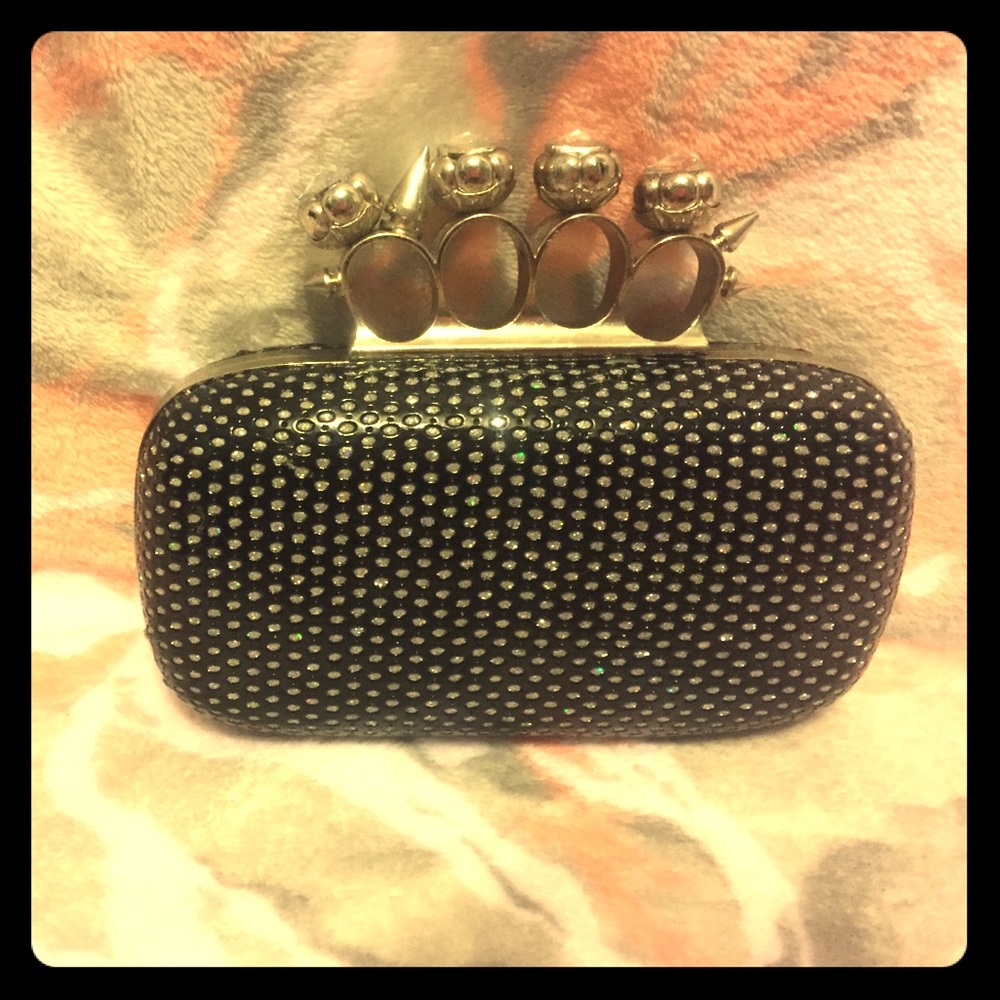 Fierce black and silver clutch