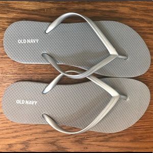 Never worn old navy flip flops.