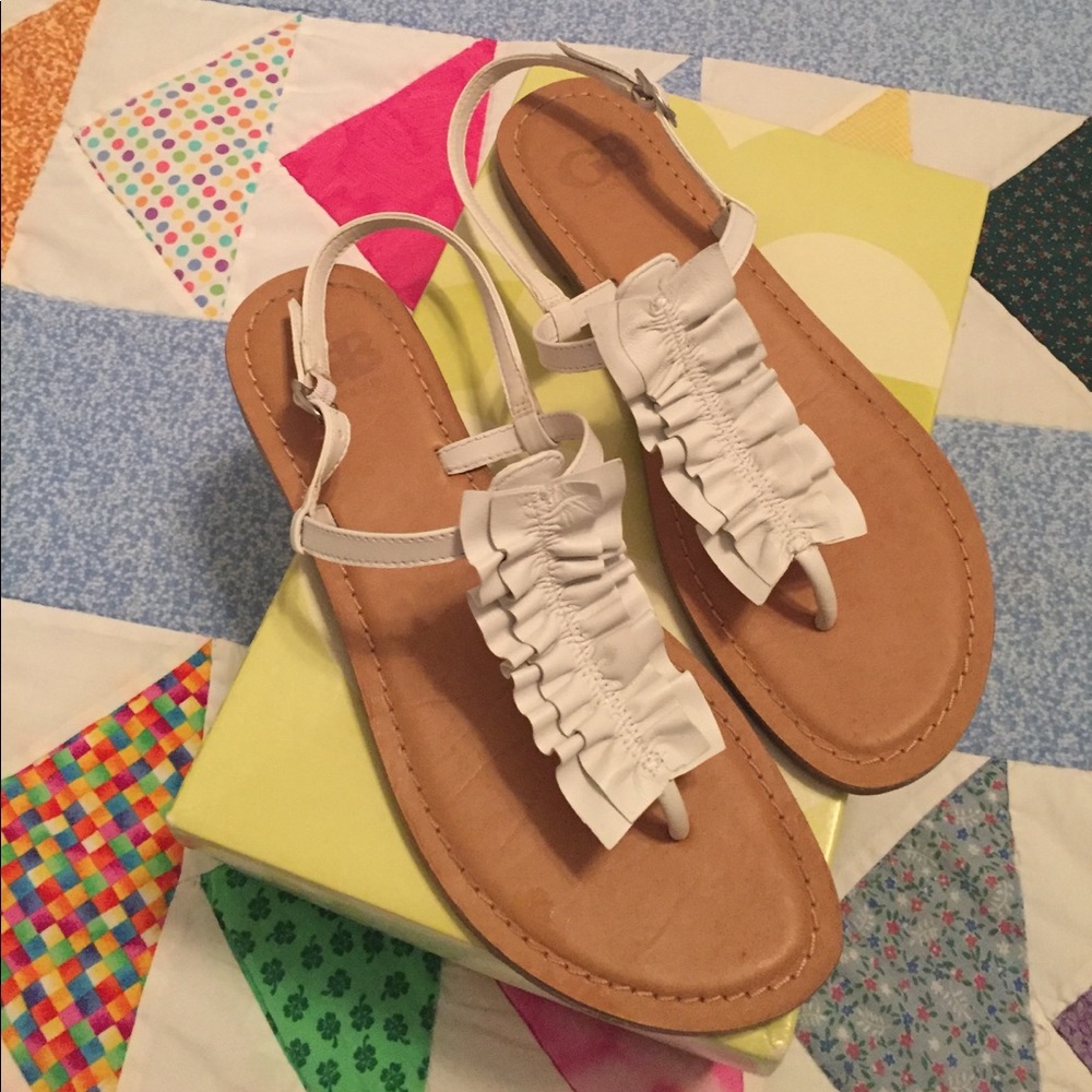 Gianni Bini white ruffle thong sandals.