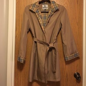 Not authentic. Burberry pattern rain coat.