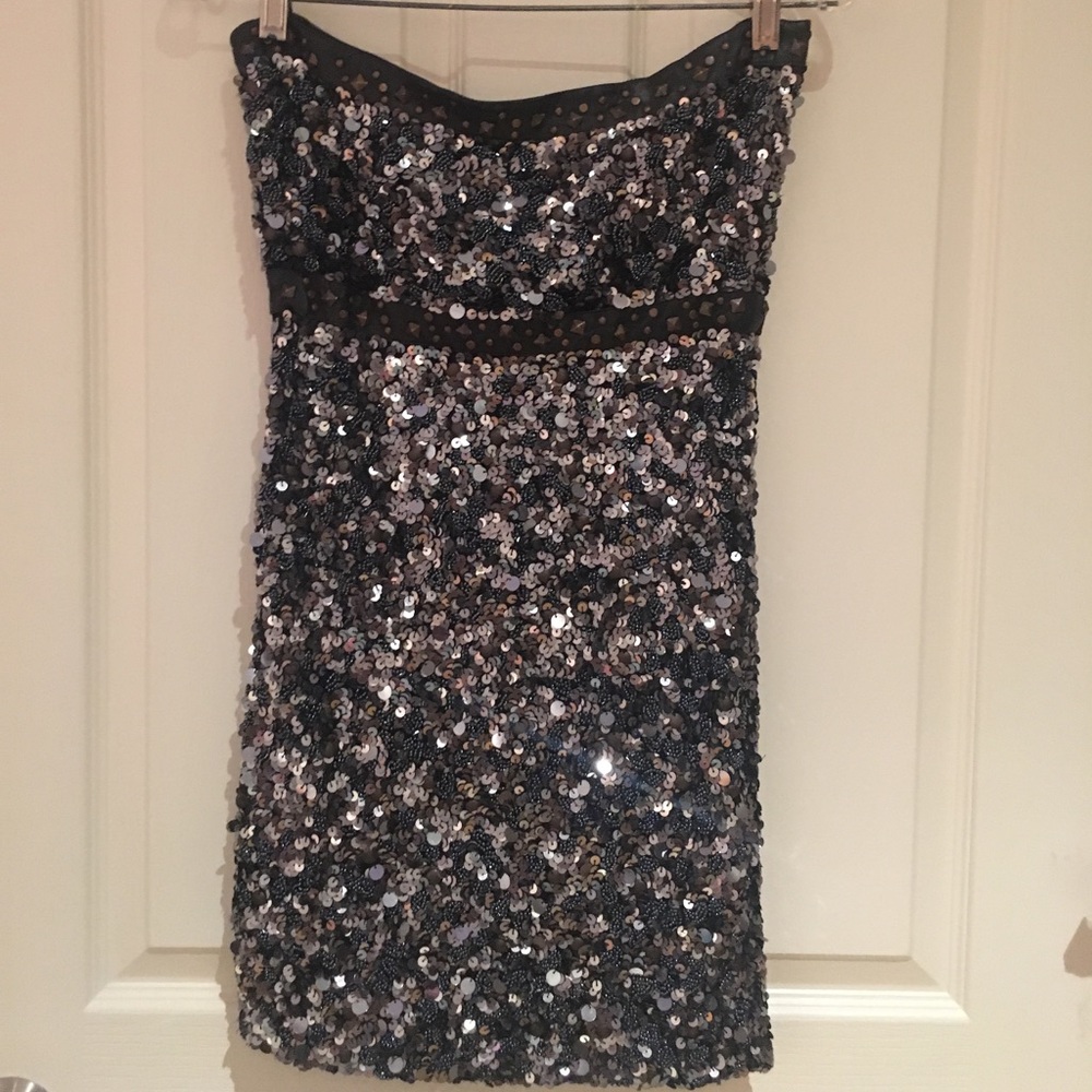NWOT. Free People leather and sequin mini