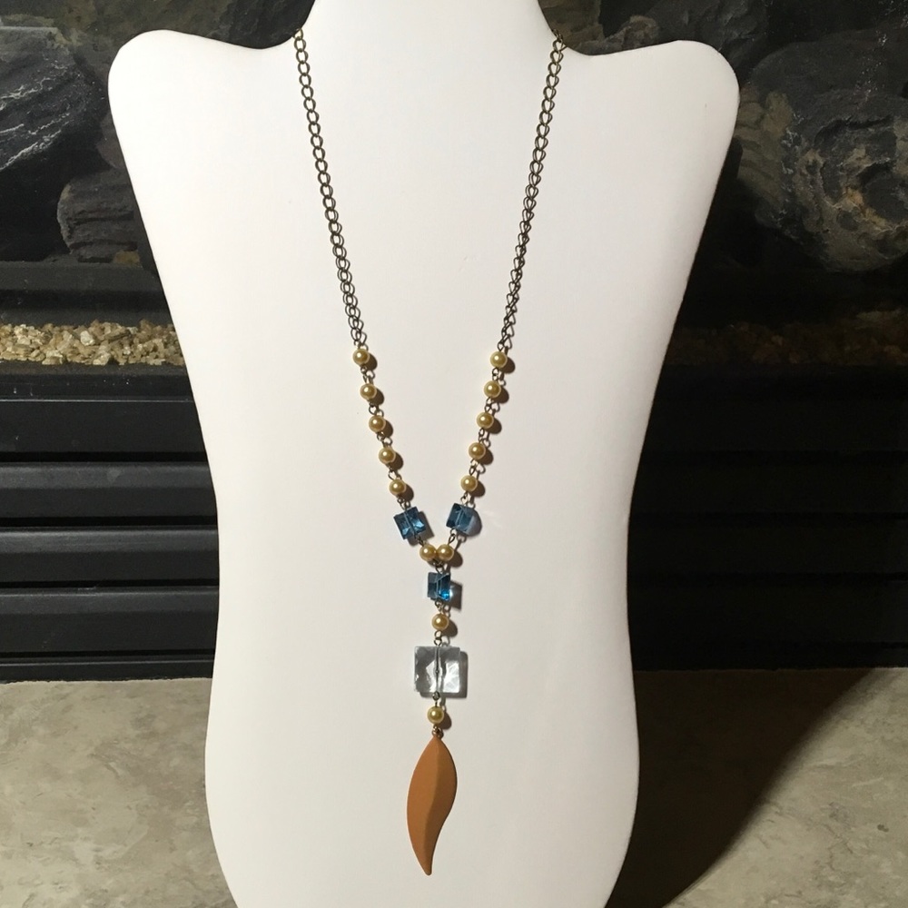 Hand made toggle necklace with peach feather