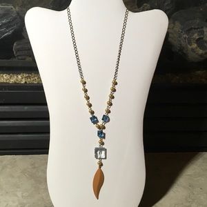 Hand made toggle necklace with peach feather