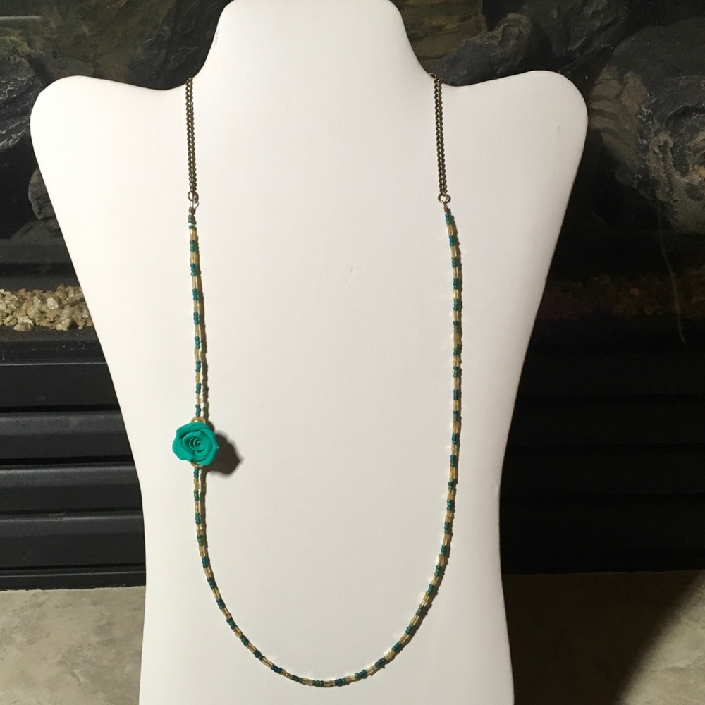 Hand made beaded necklace with green flower