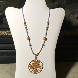 Hand Made beaded necklace with bird pendant