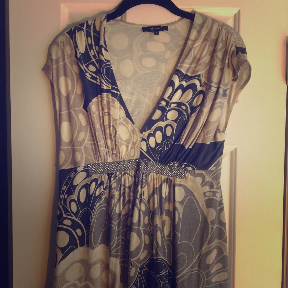 Form flattering shirt with beading detail