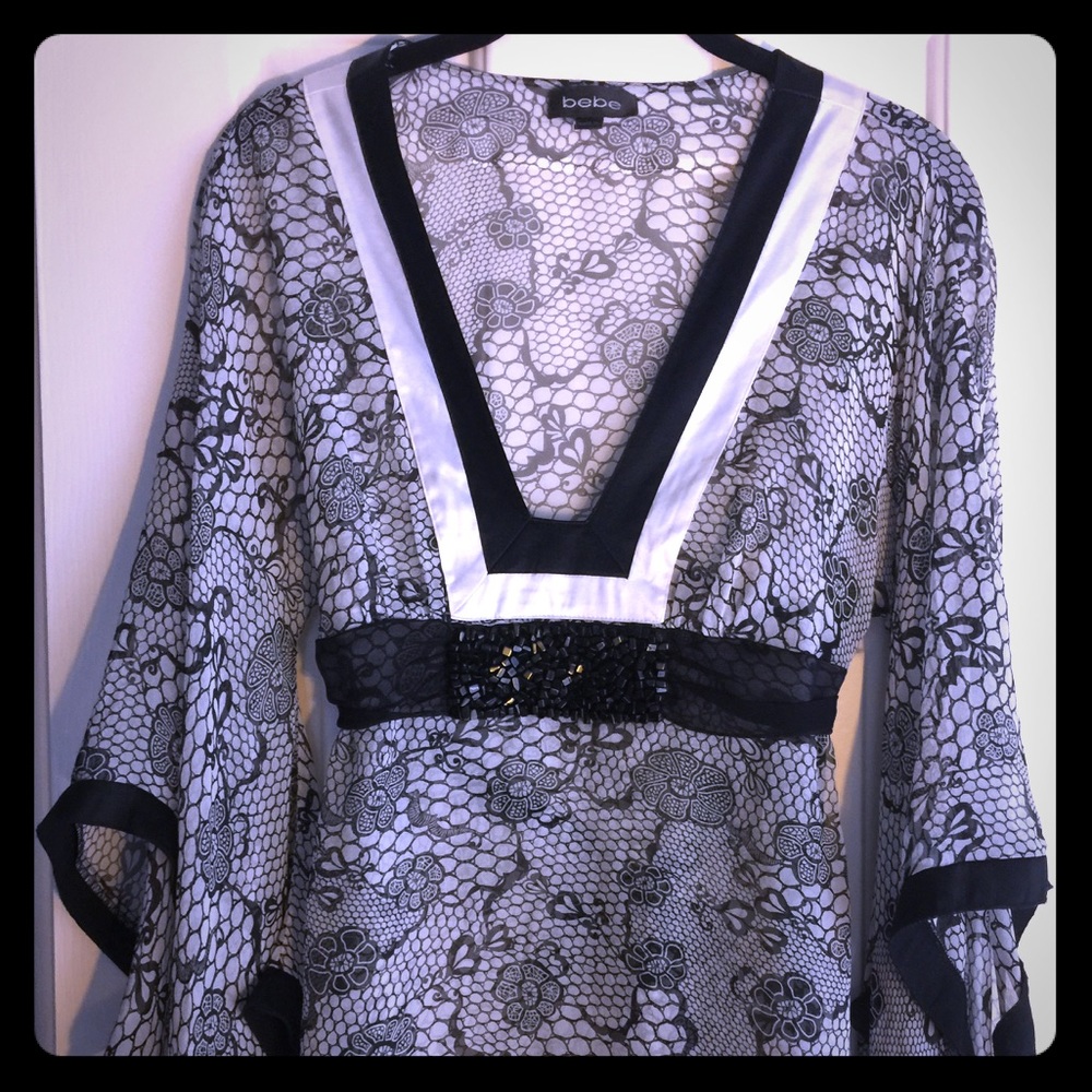 Bebe sheer kimono style too with beaded detail.