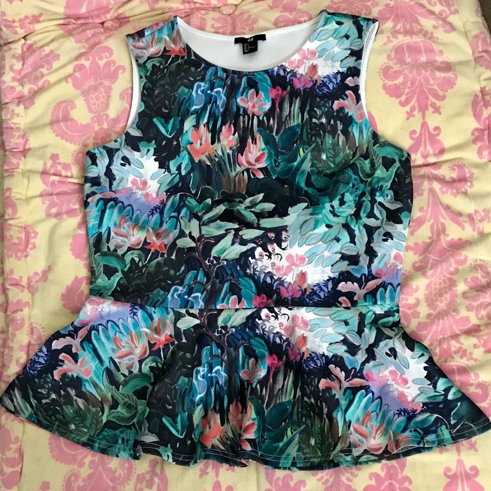H&M watercolor peplum top. Size: L