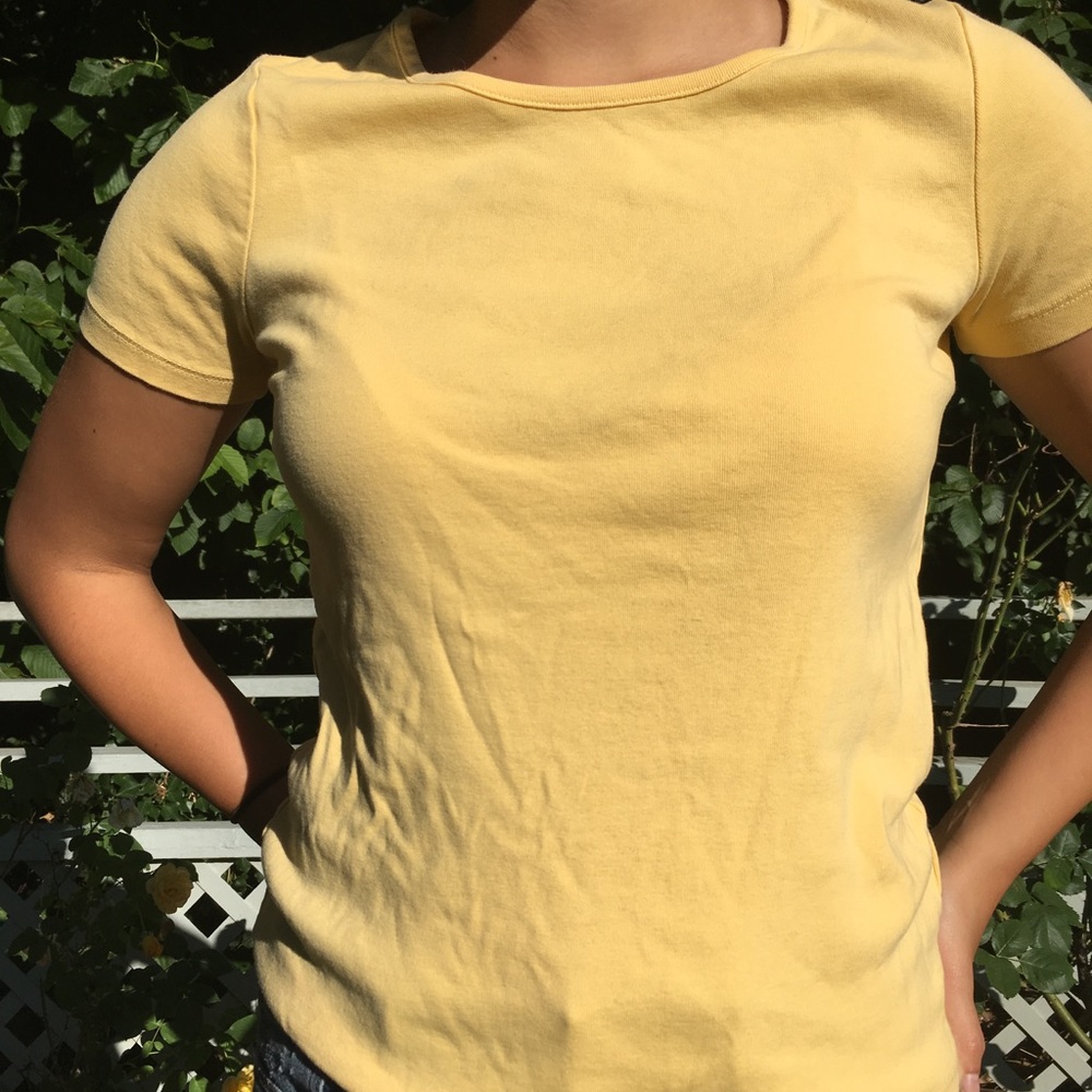 100% cotton yellow T-shirt.